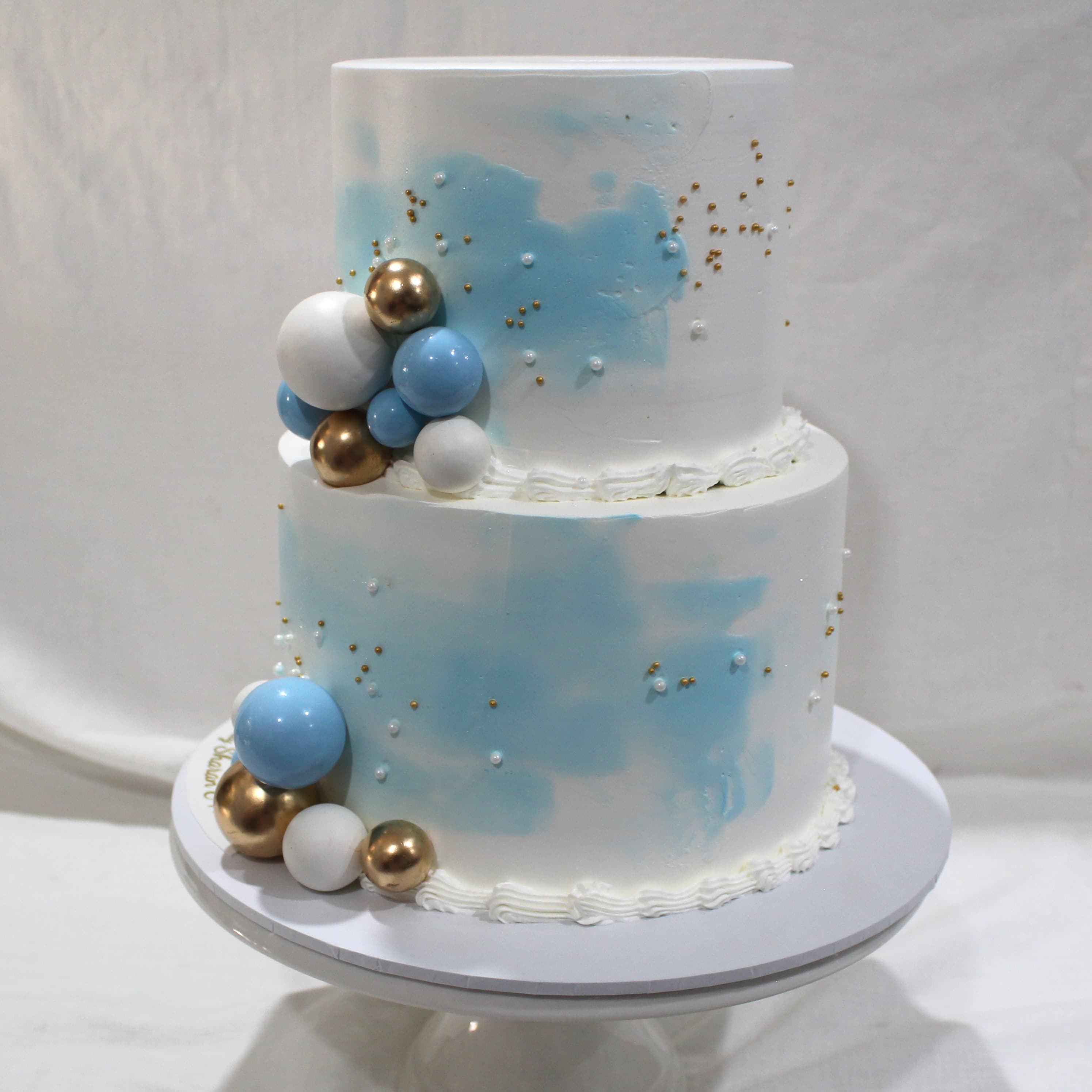 Celebration cake with blue gold sphere birthday detail — Angel Bakes, Adelaide