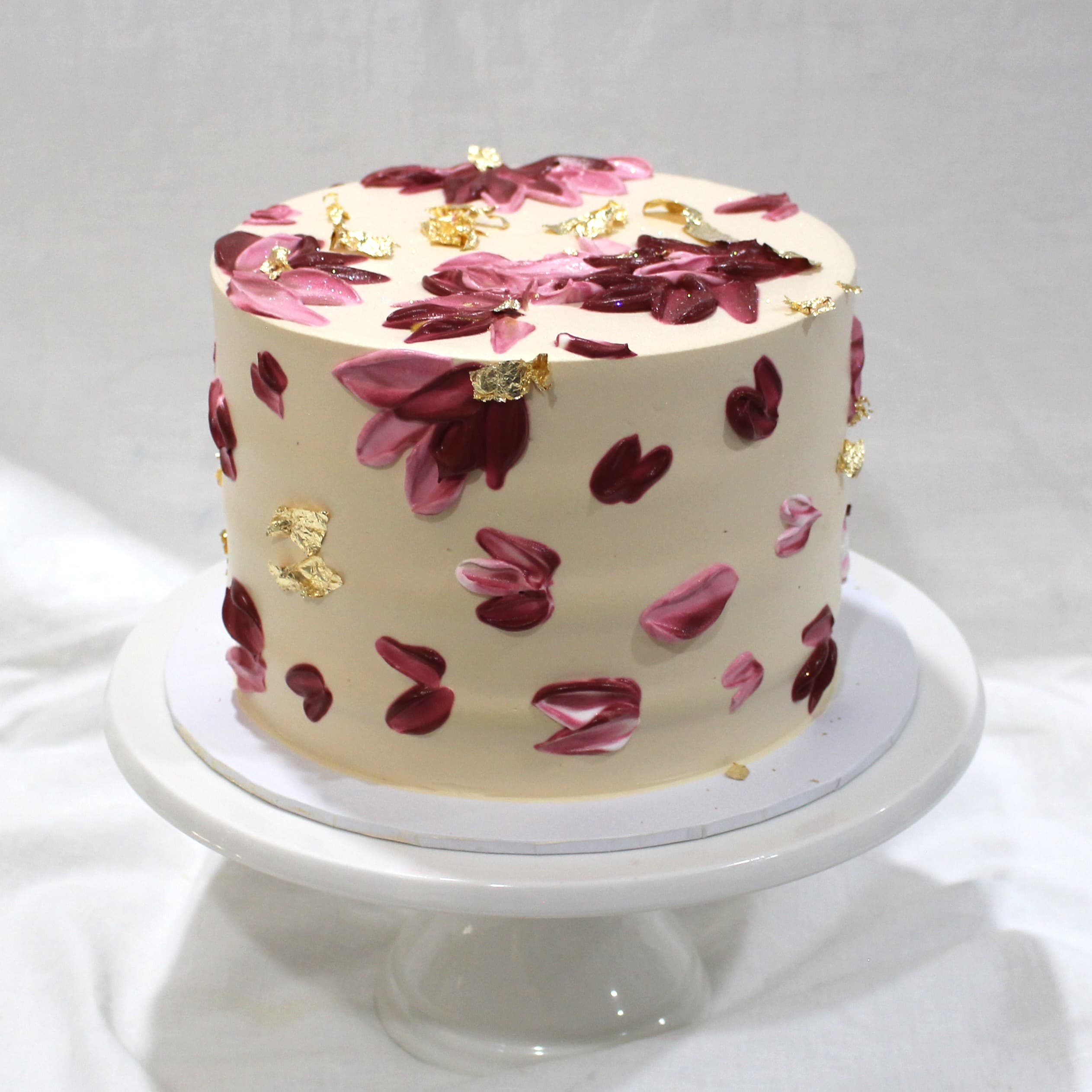 Custom cake with burgundy pink floral gold leaf detail — Angel Bakes, Adelaide