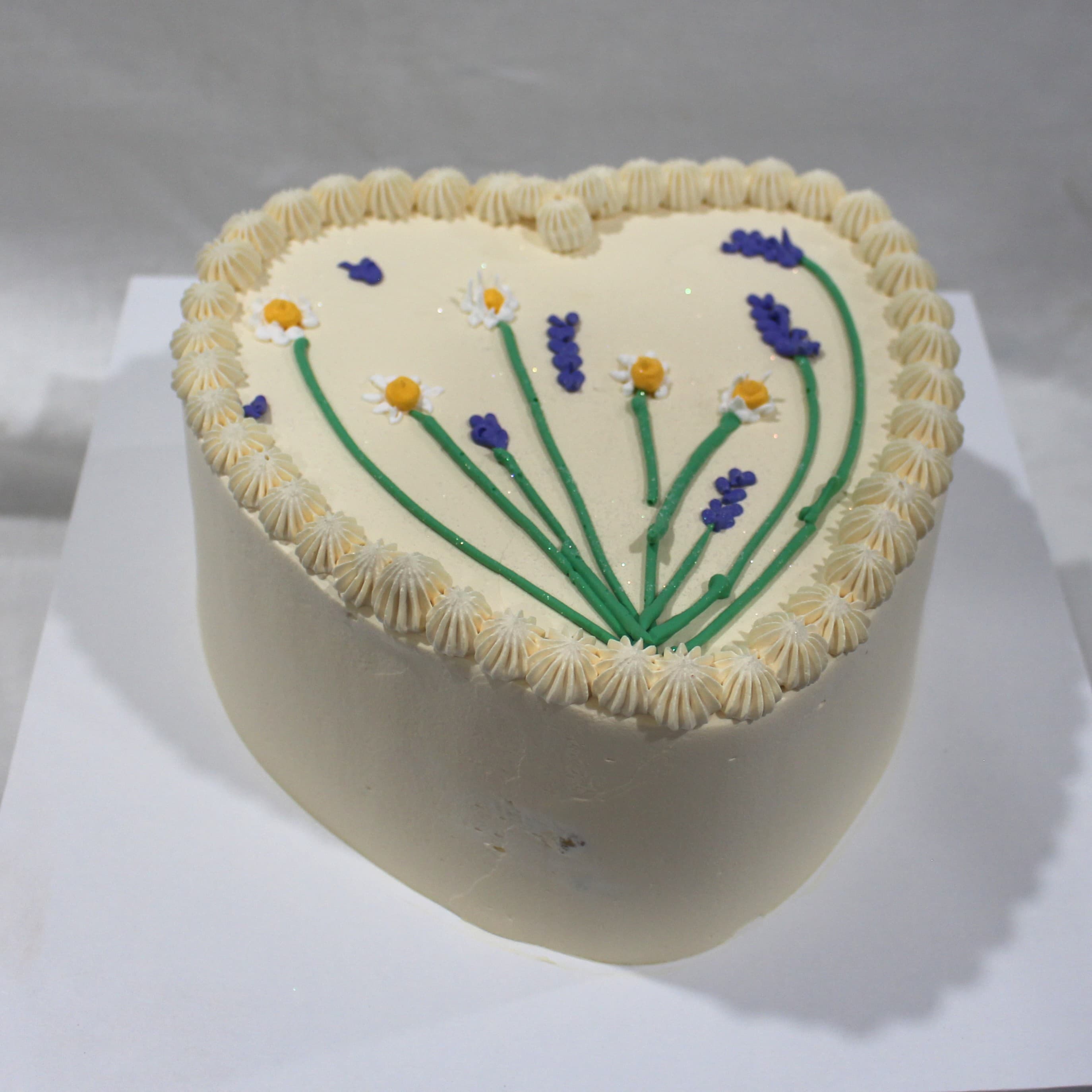 Custom cake with daisy lavender heart detail — Angel Bakes, Adelaide